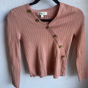pink sweater with fake buttons